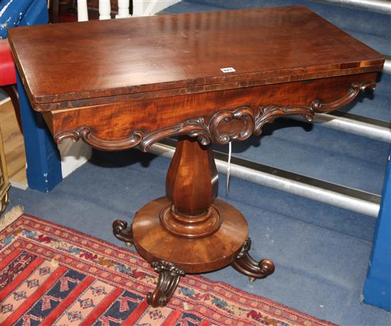 A Victorian mahogany card table W.91cm.